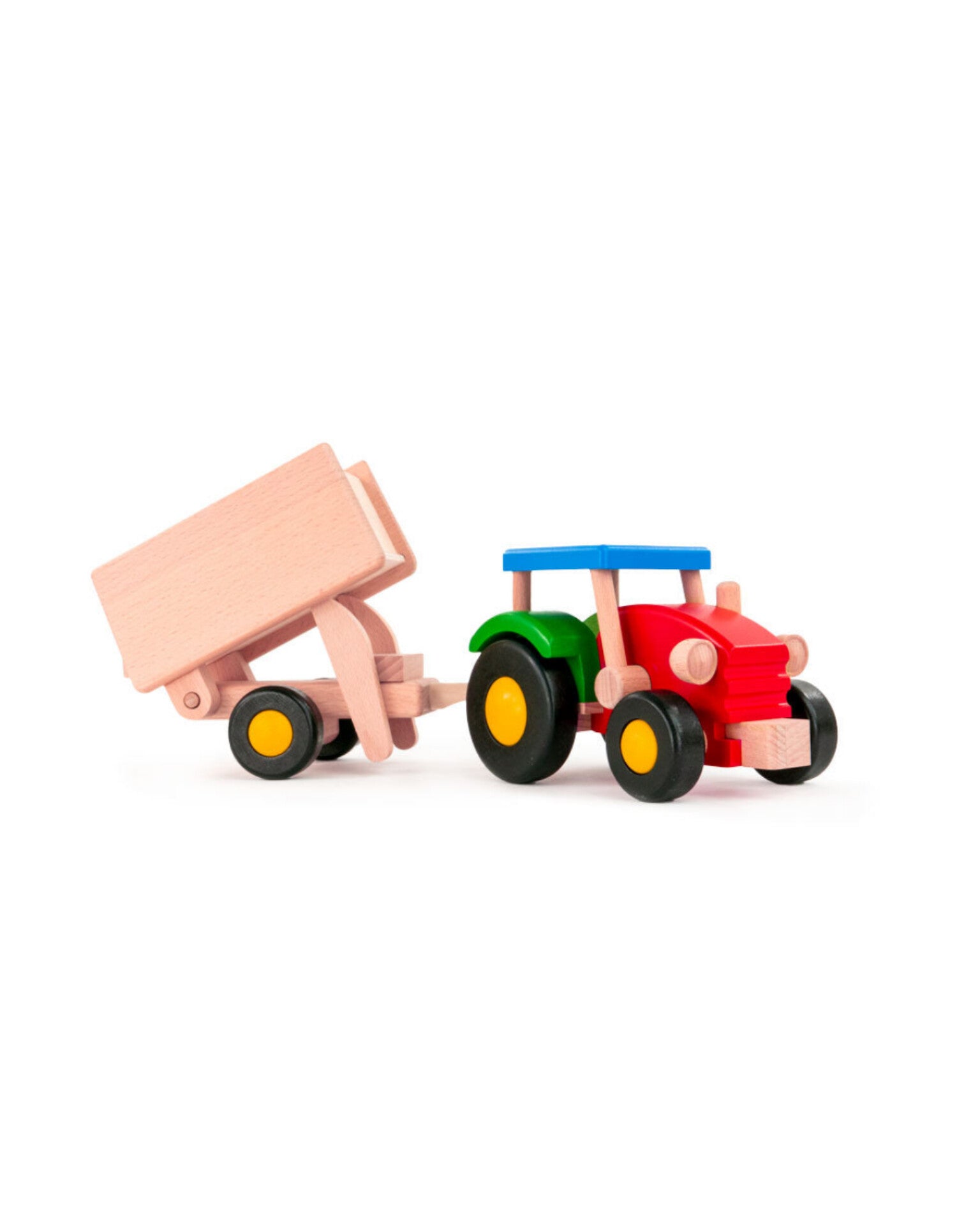 Traktor med henger i tre, perfekt for barn som elsker lek med kjøretøy. Håndlaget og robust, en flott gaveide for små entusiastiske hender. Finnes hos Snekkerbua.